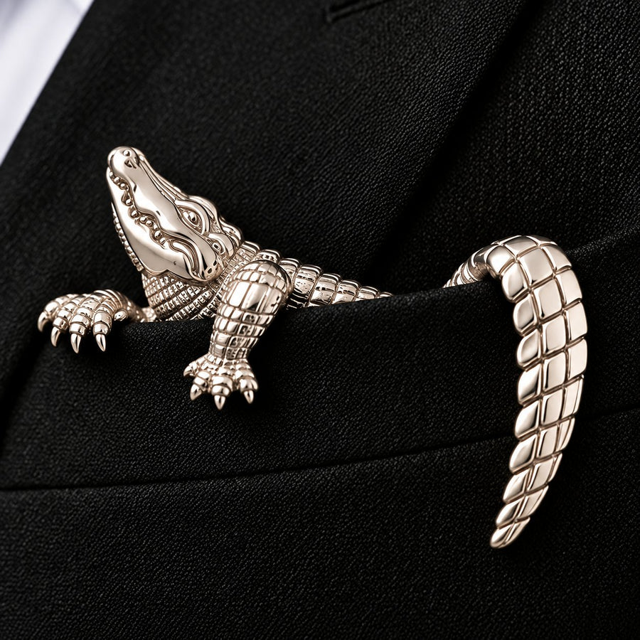 Silver alligator accessory on black jacket