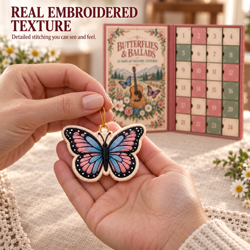 Close-up of a finished butterfly keepsake showing colorful stitched texture and hanging loop